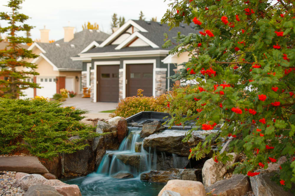 House by creek at Touchmark at Wedgewood in Edmonton, Alberta