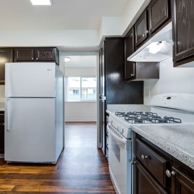 Brown cabinets in a kitchen at Forster Hills in Oceanside, California