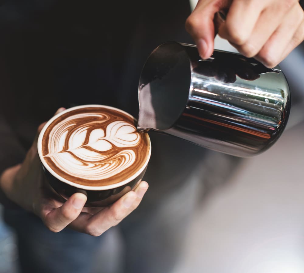 Barista pouring a latte near Terra at Hazel Dell in Vancouver, Washington