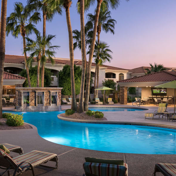 Luxurious resort-style swimming pool and hot tub at San Prado in Glendale, Arizona