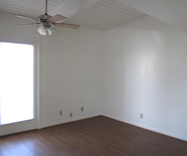 A room with wood flooring at Dam Neck in Virginia Beach, Virginia