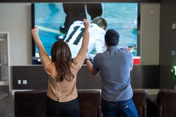 Residents enjoying the game on a big screen tv at San Norterra in Phoenix, Arizona