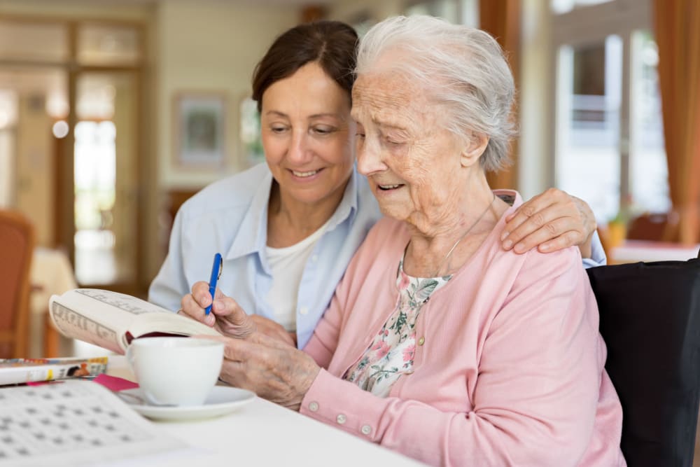 Resident and caregiver at The Blake at Carnes Crossroads in Summerville, South Carolina