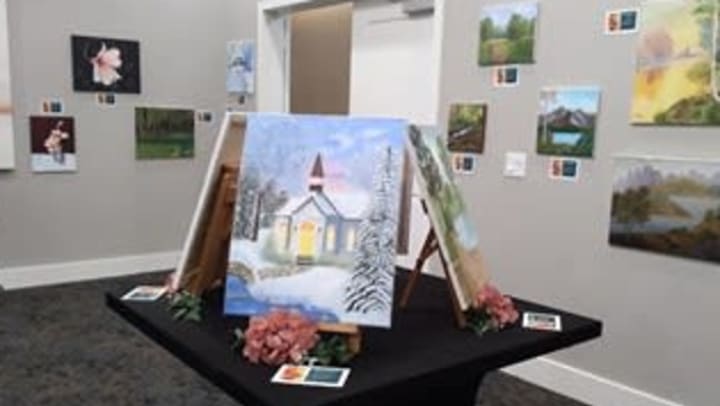 Art donated by Hidden Springs of McKinney residents, on display for fundraising auction, Mckinney, TX.