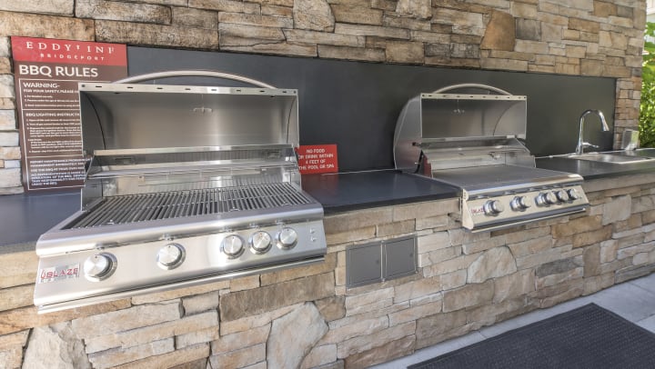 Two built in barbeques next to each other