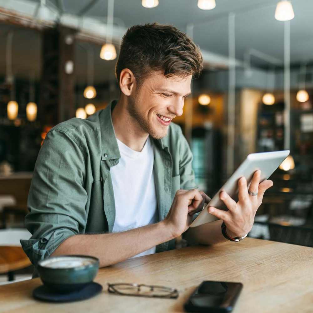 Resident having coffee at Avalon I Apartments in North Charleston, South Carolina