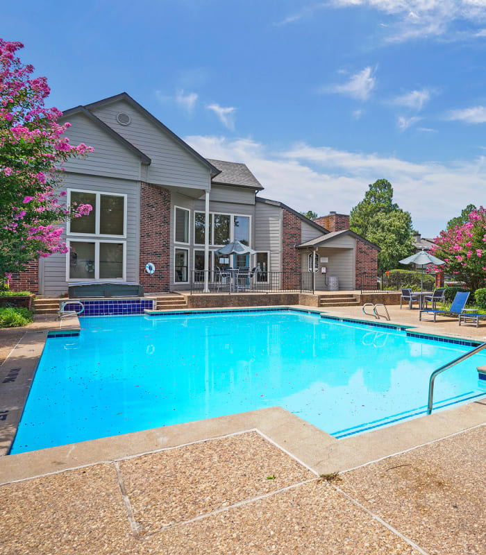 The Pool with seating at Creekwood Apartments in Tulsa, Oklahoma