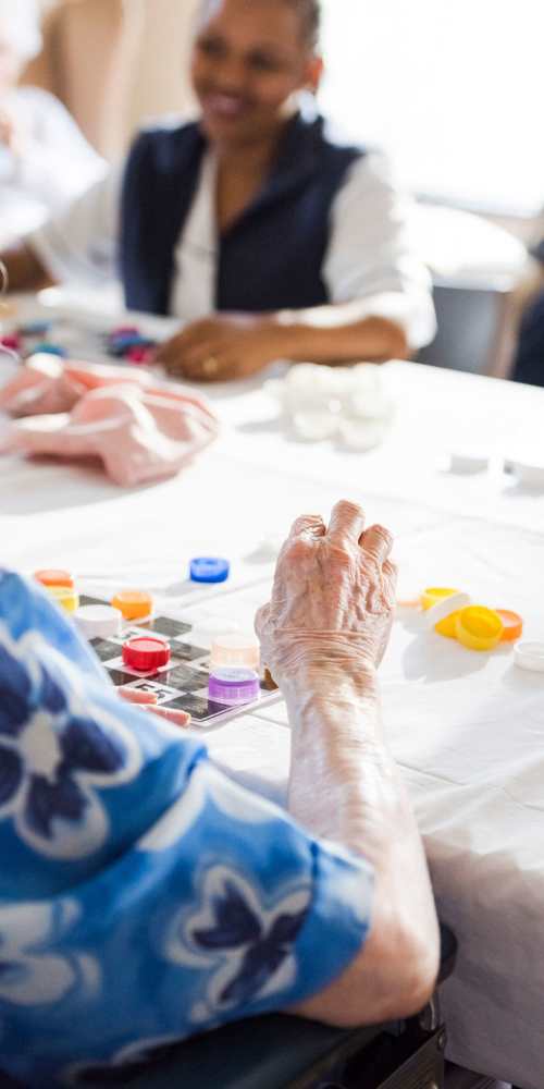 Residents playing bingo at a Arcadia Communities community