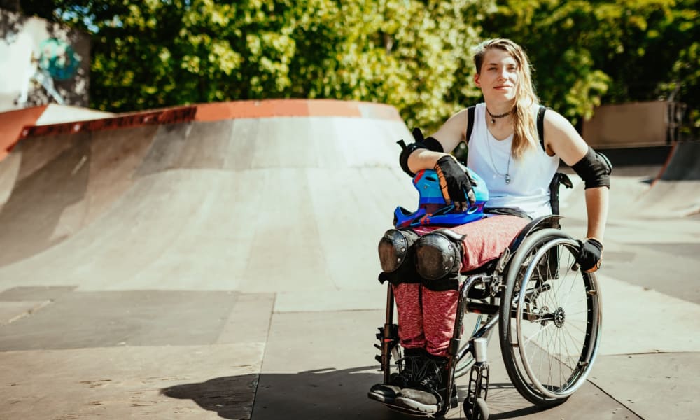 Resident shredding her wheelchair at the skatepark near The Landings at Steeplechase in Houston, Texas
