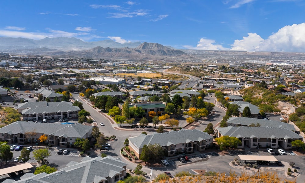 Drone shot of the property and mountains at Acacia Park Apartments in El Paso, Texas