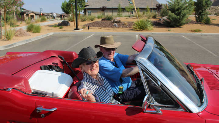 Residence in a red convertible
