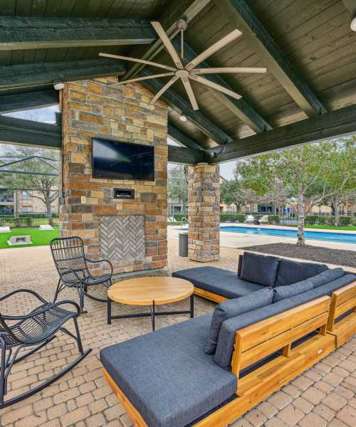 Sitting area with fireplace at Barron Park in Pearland, Texas