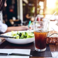 Sunny patio of a local eatery near Riverside Towers Apartment Homes in New Brunswick, New Jersey