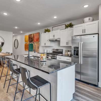 Kitchen featuring island and upgraded appliances at BB Living at The Oaks in Meridian, Idaho
