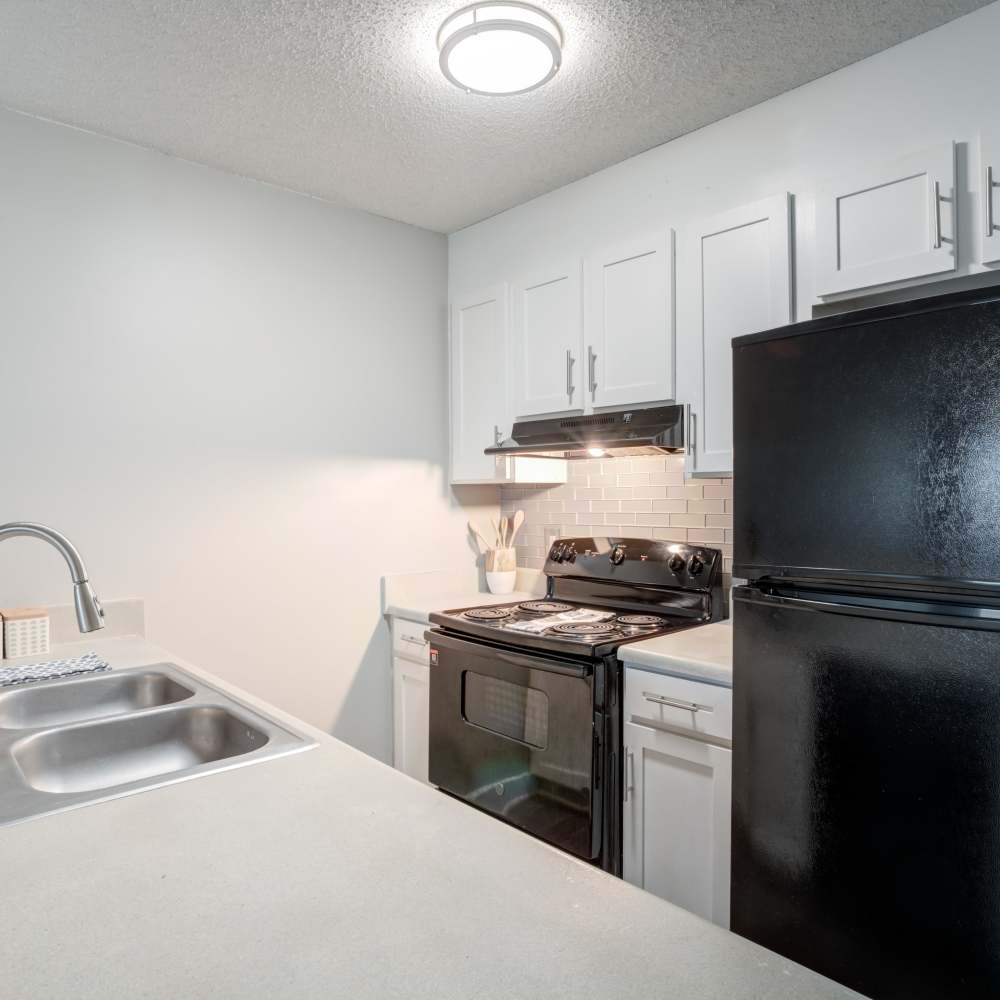 Kitchen with a breakfast bar at 1022 West Apartment Homes in Gaffney, South Carolina