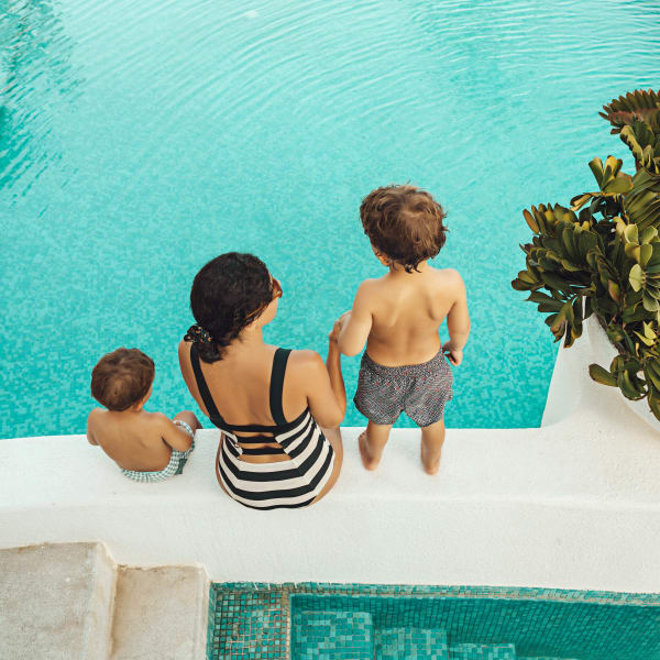 Resident mom and sons enjoying some pool time at The Loop at 2800 in Sarasota, Florida