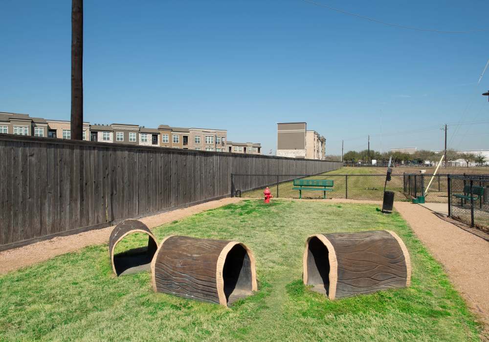 Apartment community playground with play items at Nantucket at Fannin Station in Houston, Texas