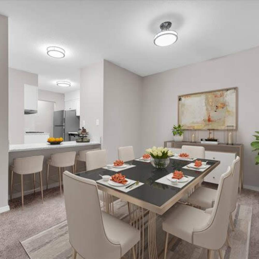 Bright dining area with table seating at Woodbrook in Gardendale, Alabama