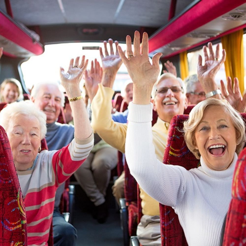 Happy residents on the bus at Regency Park Place at Corvallis in Corvallis, Oregon