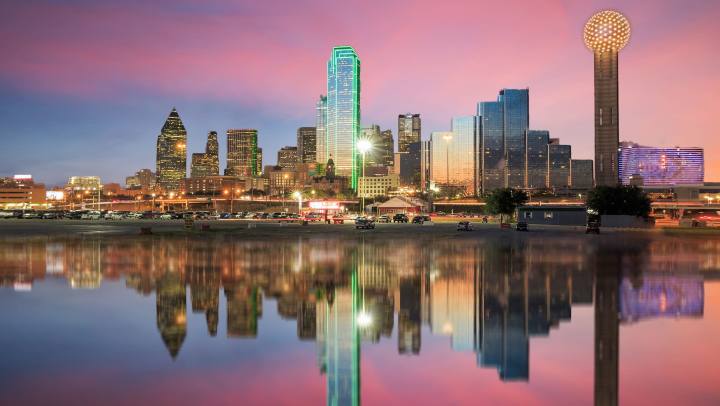Dallas skyline representing the city’s growing appeal, strong job market, affordable lifestyle, diverse culture, and opportunities for professionals and families.