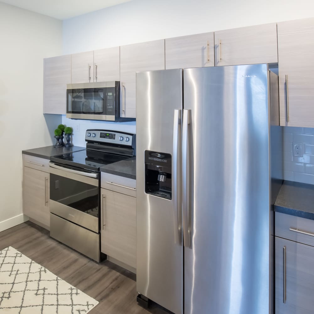 Kitchen with wooden flooring  at Shiloh Commons in Billings, Montana