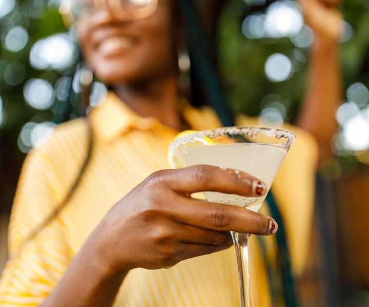 Resident enjoying a cocktail near Pittsford Village Estates in Pittsford, New York