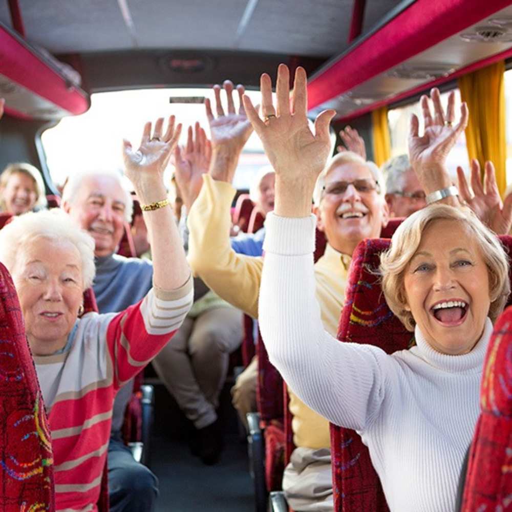 Happy residents on the bus at Regency at Hualalai in Kailua-Kona, Hawaii