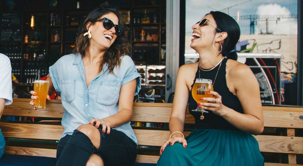 Residents enjoying a beverage near Oakville Apartments in Austin, Texas