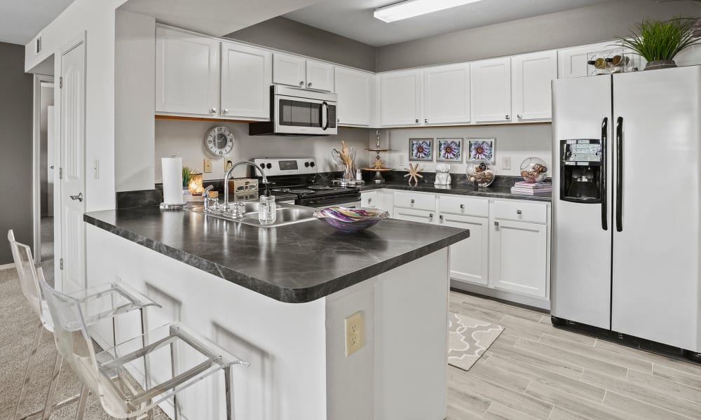 Kitchen at Cottages at Abbey Glen Apartments in Lubbock, Texas