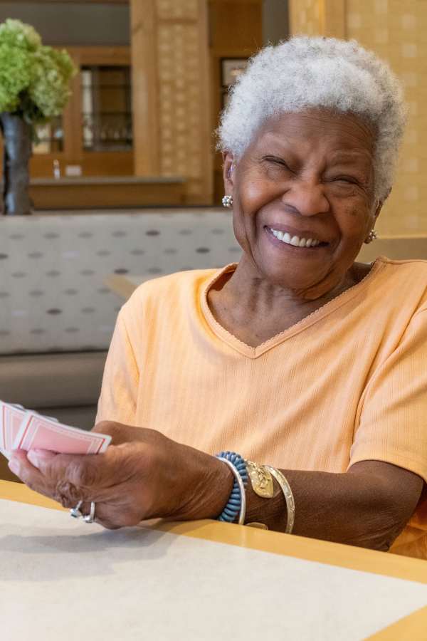 Smiling resident at Merrill Gardens at Rolling Hills Estates in Rolling Hills Estates, California