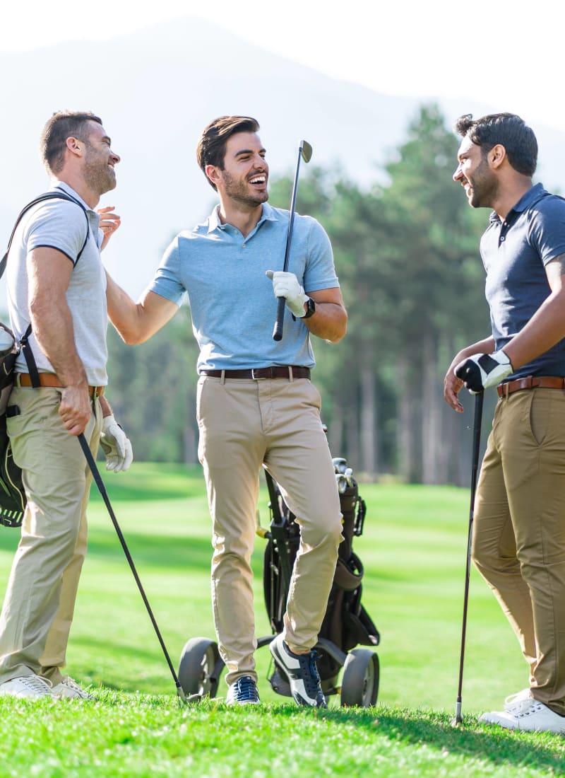 Friends playing golf near Marquis Seven Meadows in Katy, Texas