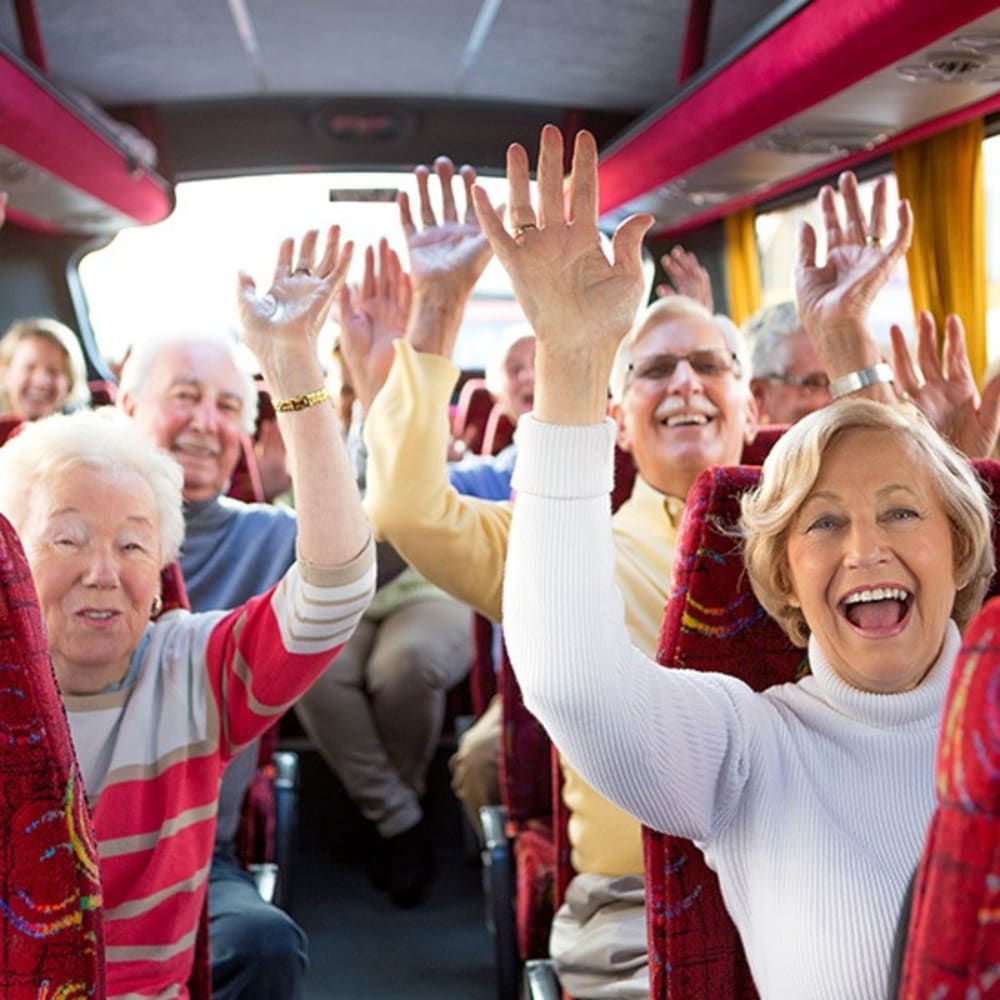Happy residents on the bus at Regency Fallbrook in Fallbrook, California