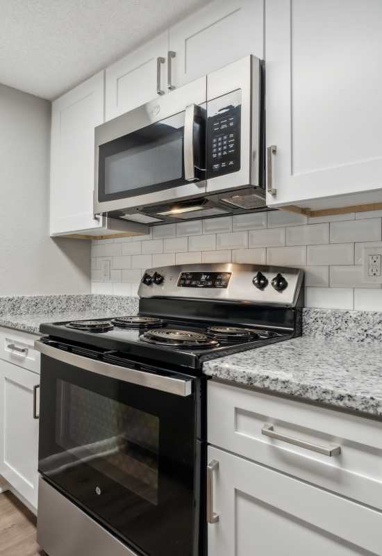Bright kitchen with backsplash at Buena Vista in Seminole, Florida