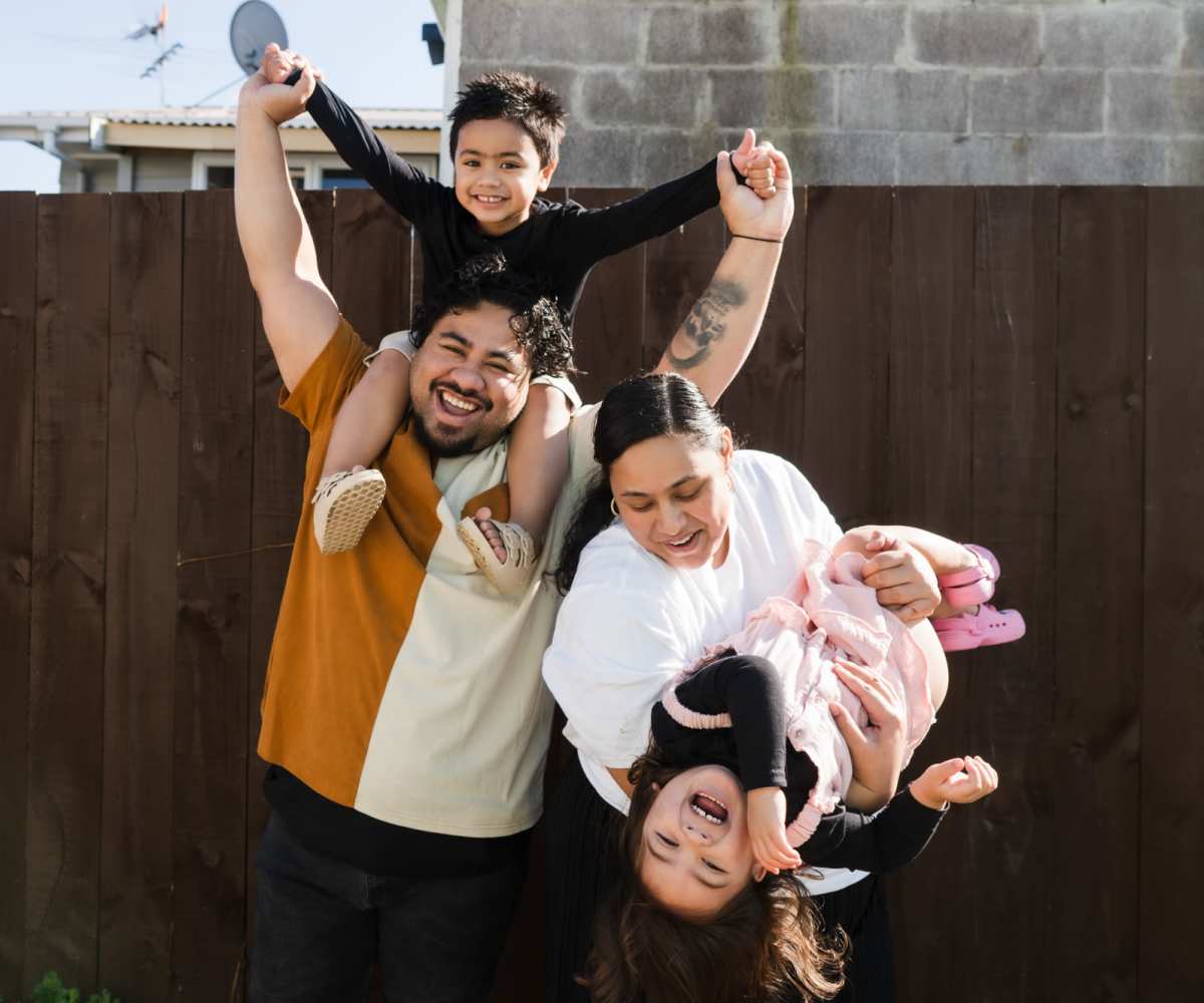 Happy resident family smilinng at Hale O Piikea III in Kihei, Hawaii 