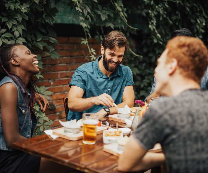 Residents enjoying food at a restaurant near Dunwoodie Place in Orlando, Florida