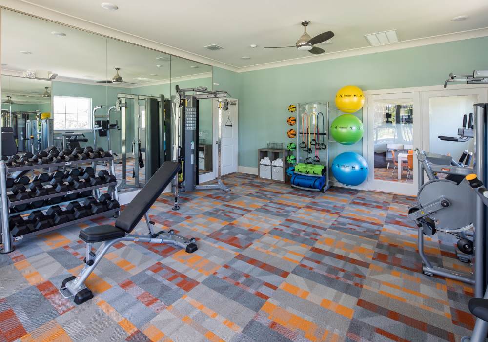 A fitness center featuring various exercise machines at Pier Park Crossings in Panama City Beach, Florida 