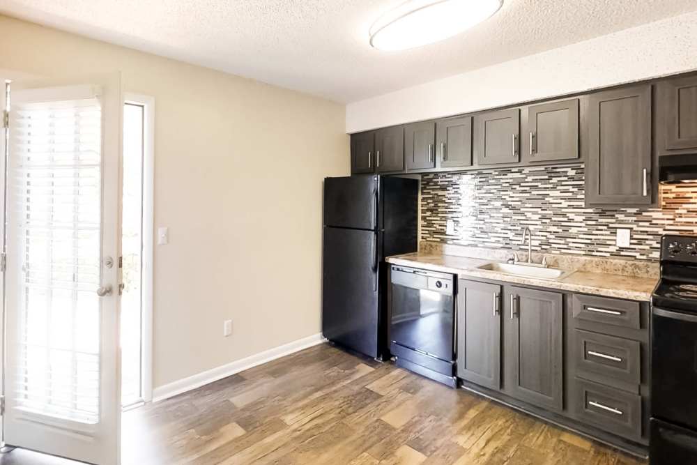 Beautiful kitchen with modern appliances at The Hills at Oakwood Apartment Homes in Chattanooga, Tennessee
