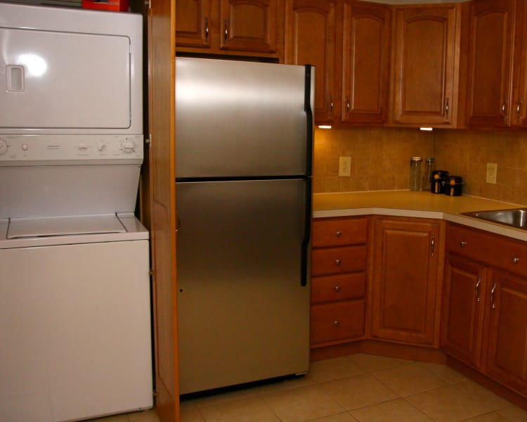 Stainless steel refrigerator and washer and dryer set at Riverwood Commons