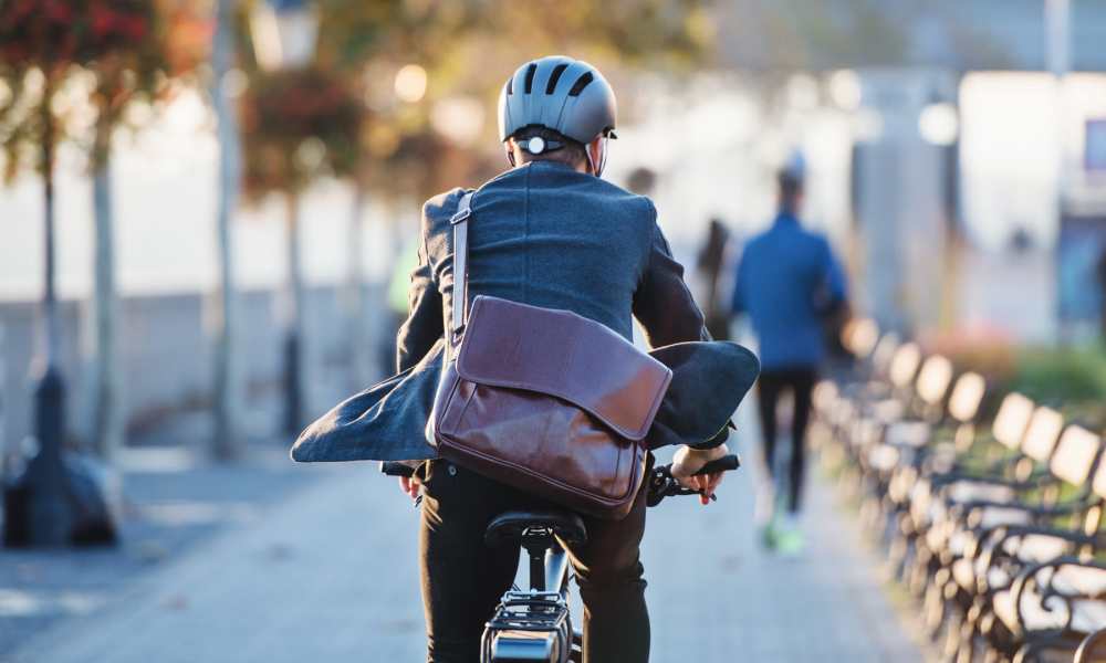 Resident bicycling near Global Ruston in Ruston, Louisiana
