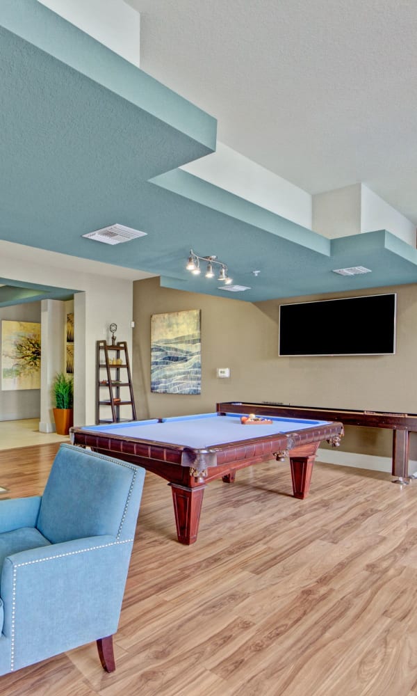 Incredible clubhouse area where residents can hang out in at The Courtney at Lake Shadow in Orlando, Florida