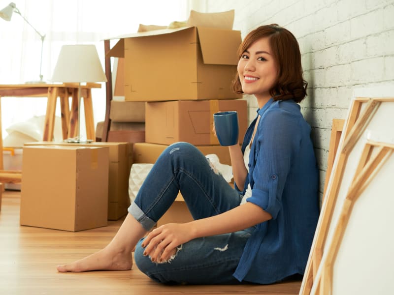 A woman packing near 603 Storage - Raymond in Raymond, New Hampshire