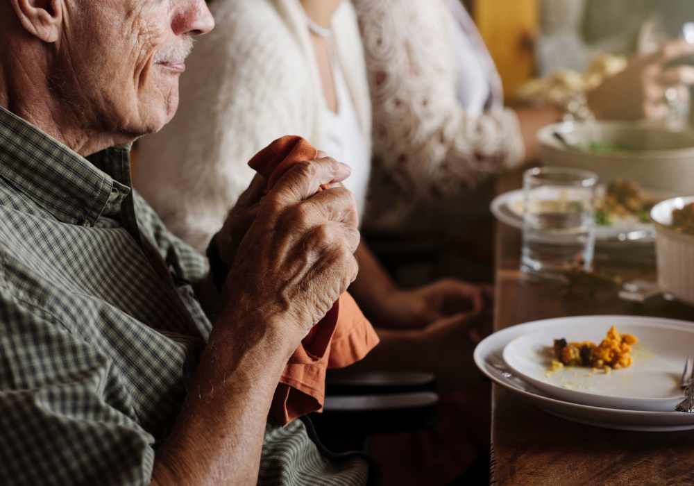 Senior man enjoying a meal at Clearwater Ahwatukee in Phoenix, Arizona