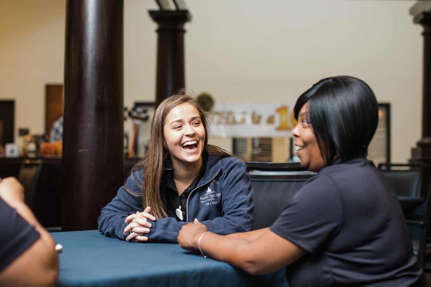 Two caregivers talking at Corp Site Testing in Bend, Oregon