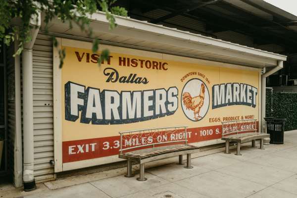 Bus stop with bench and billboard near  Archer Medical District in Dallas, Texas
