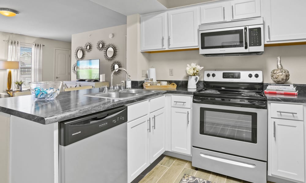 Kitchen at Cottages at Tallgrass Point Apartments in Owasso, Oklahoma