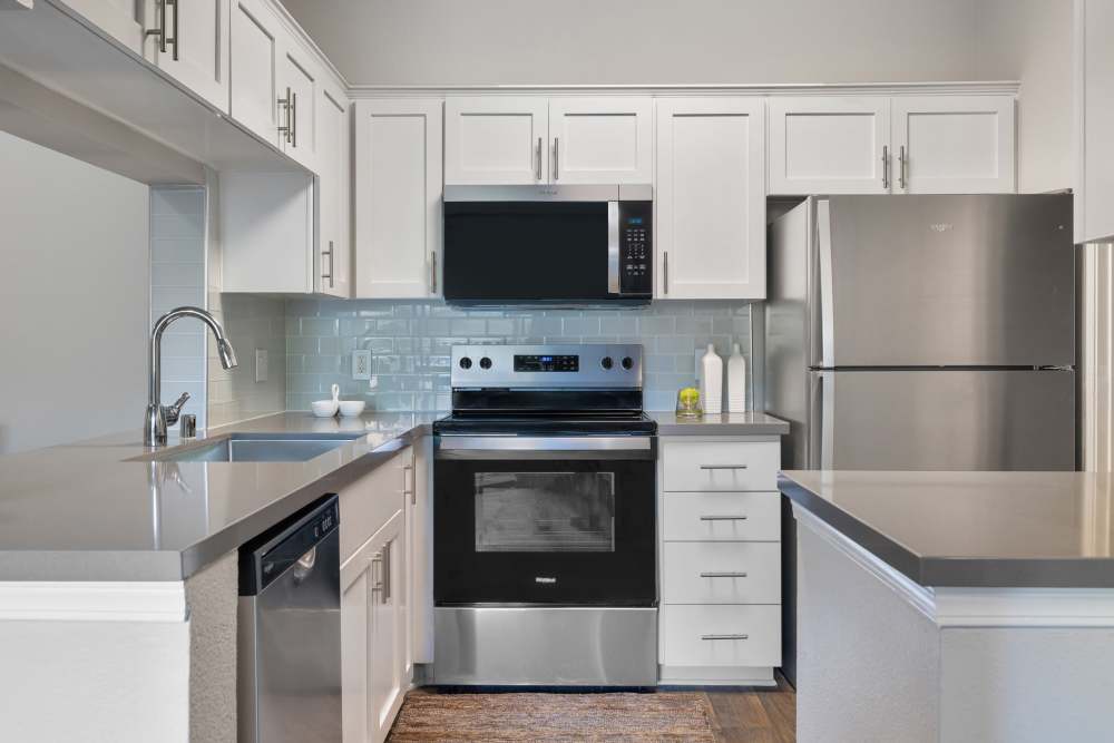 Beautiful, gourmet kitchen in a model home at Alize at Aliso Viejo Apartment Homes in Aliso Viejo, California