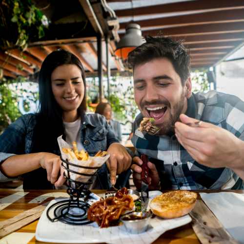 Happy couple having lunch near Two West End in Charlotte, North Carolina