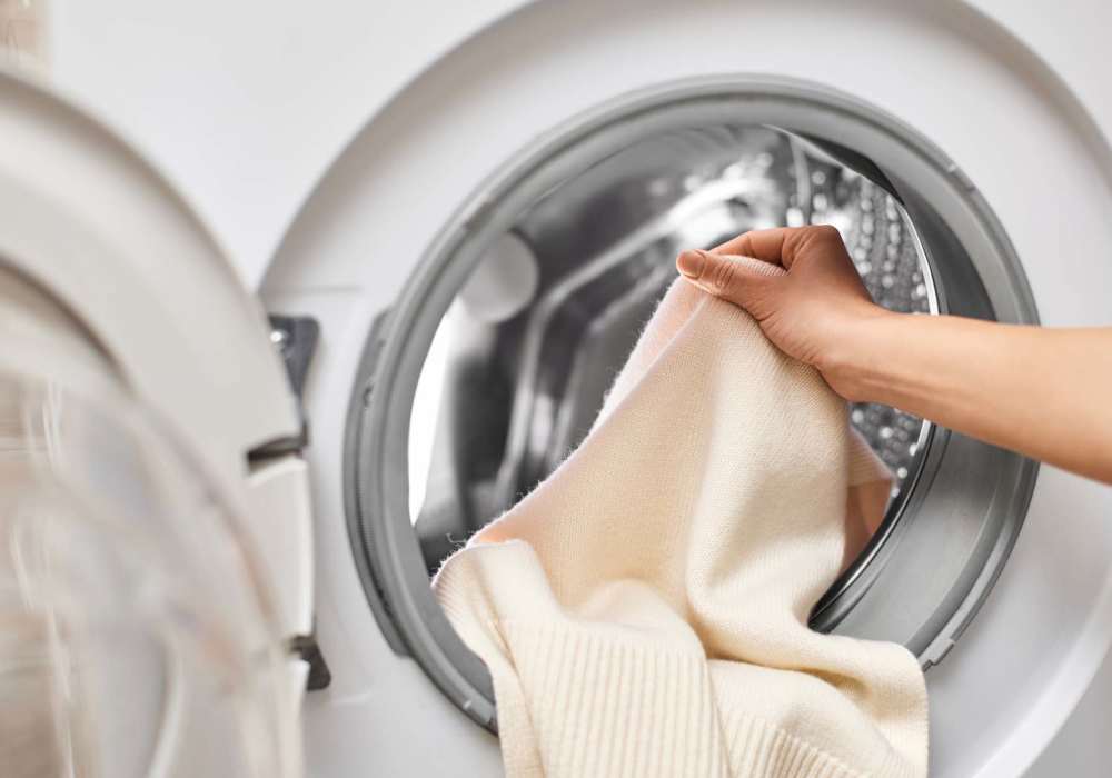 A laundry room featuring a washer at Regents Park Apartments in Bensenville, Illinois