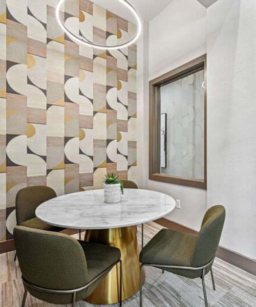 Clubhouse with a table and chairs at Barron Park in Pearland, Texas