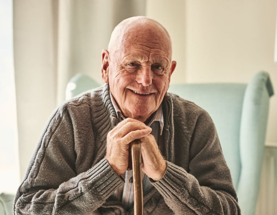 Smiling resident at Heritage House in Clearwater, Florida
